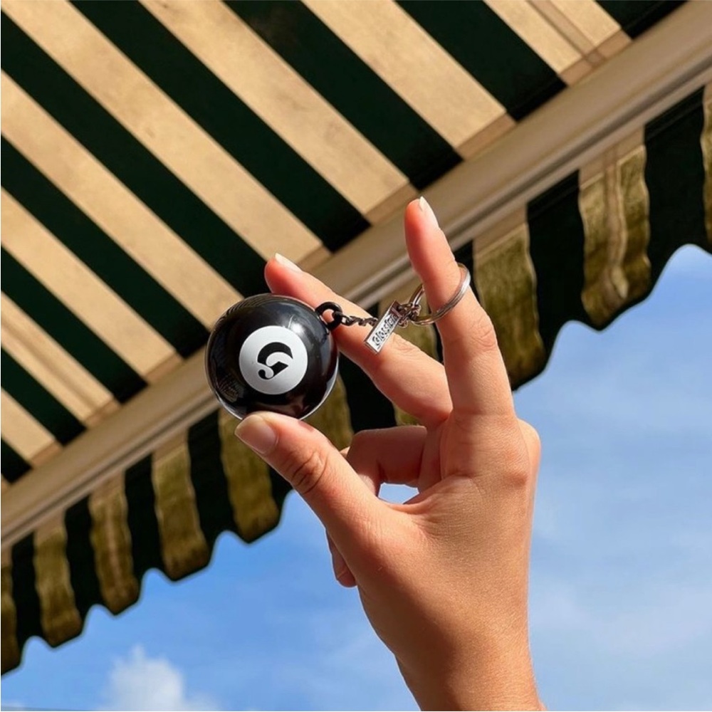 Glossier 8 ball keychain NWT